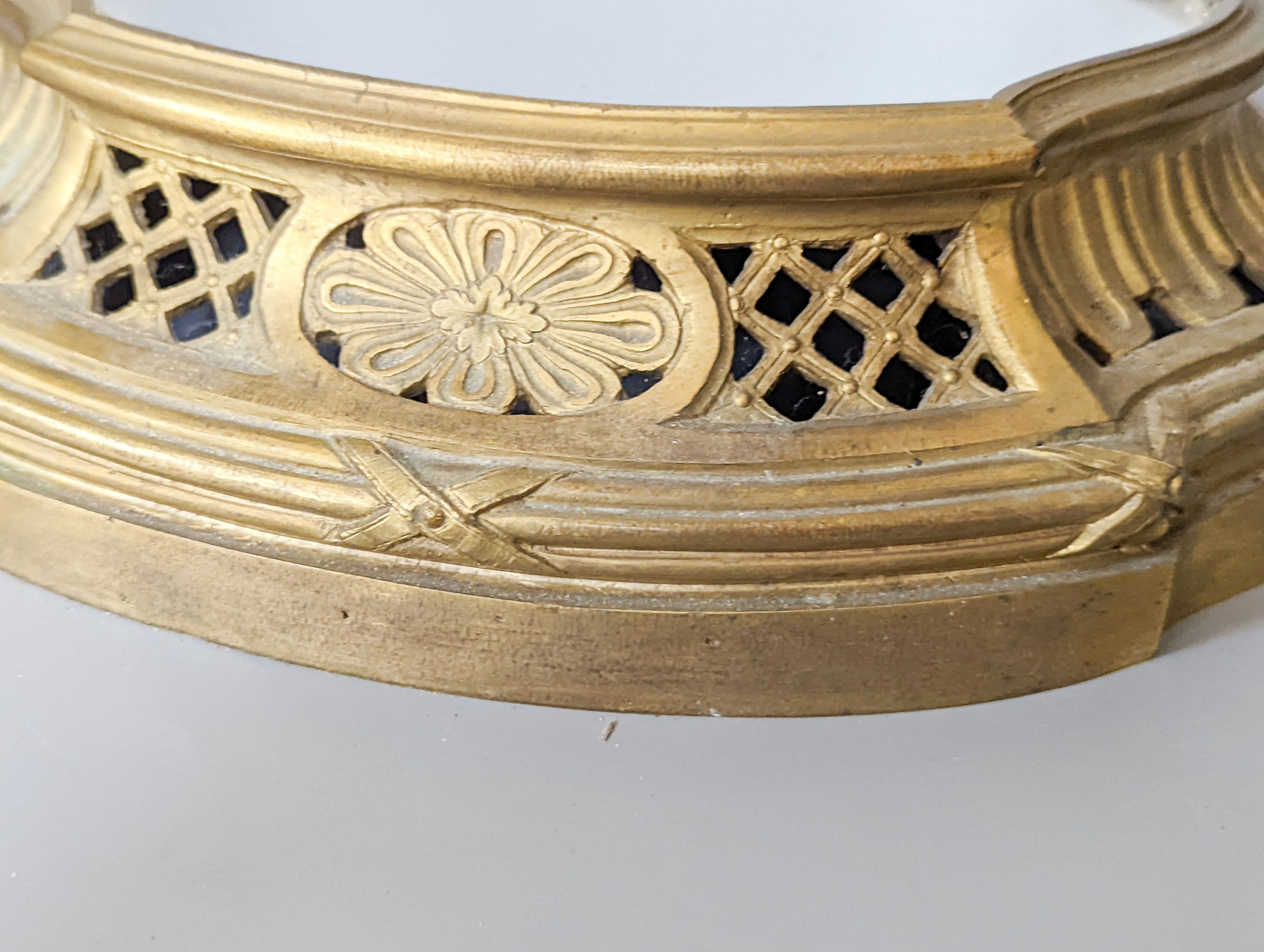 A pair of mirrored ormolu plateaus, 28cm